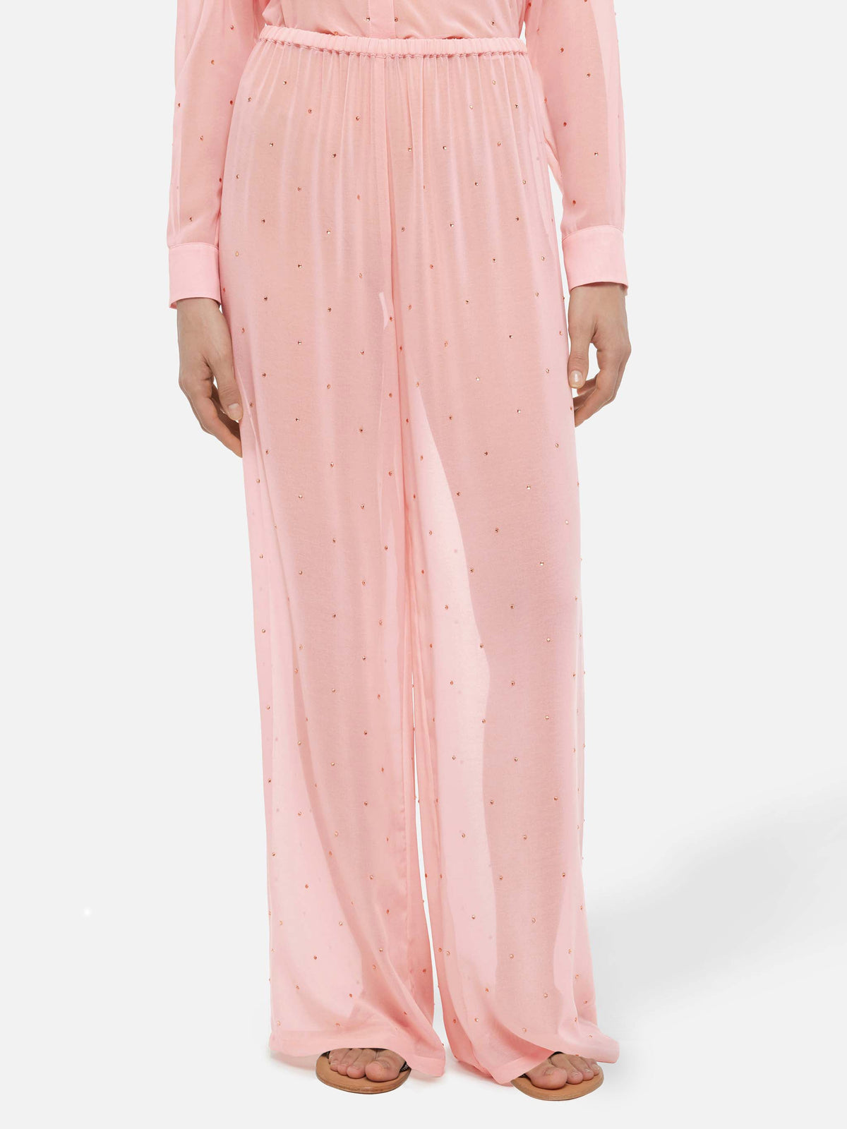 Pantaloni Amalia rosa a gamba ampia in georgette con strass
