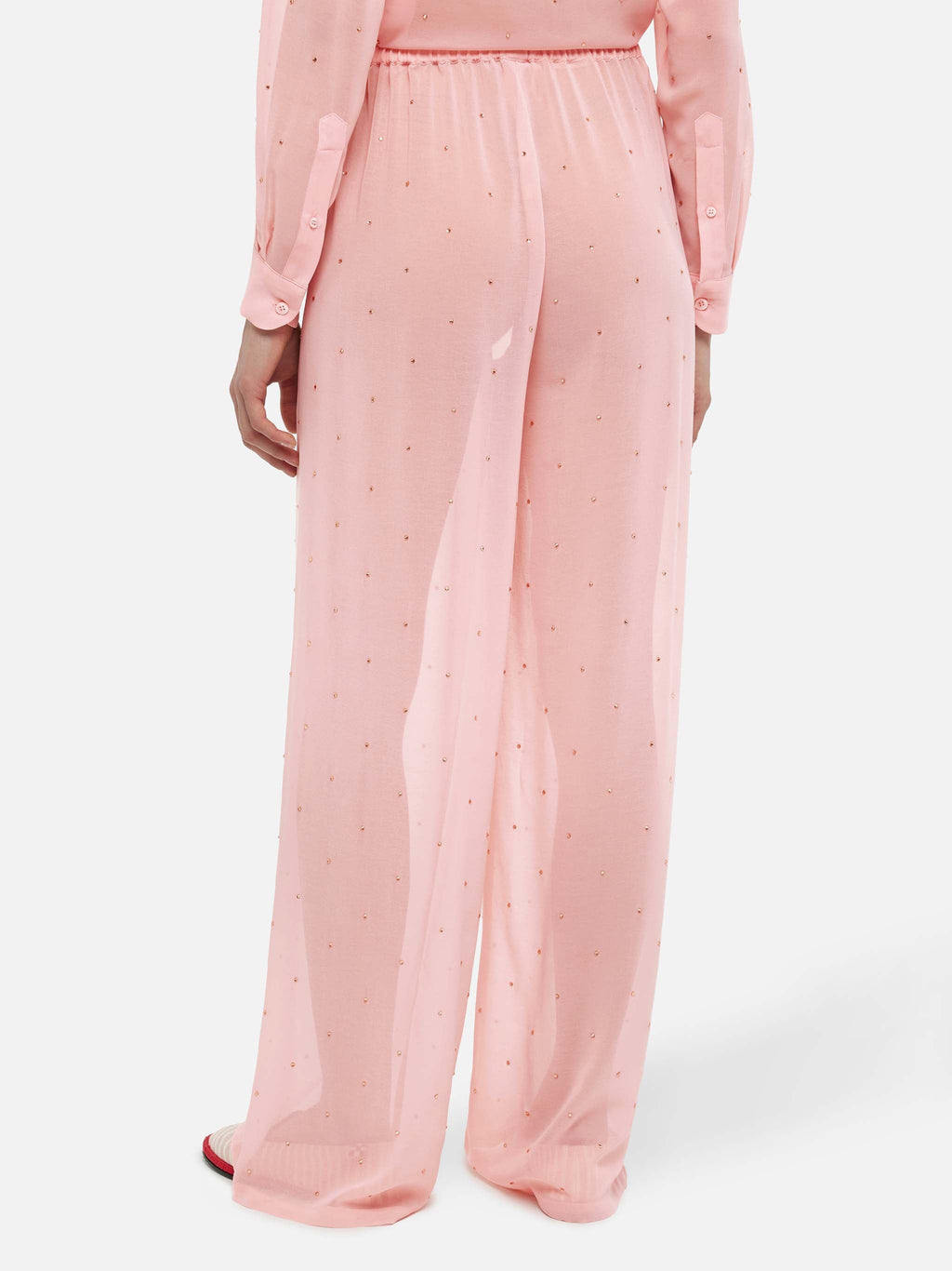 Pantaloni Amalia rosa a gamba ampia in georgette con strass