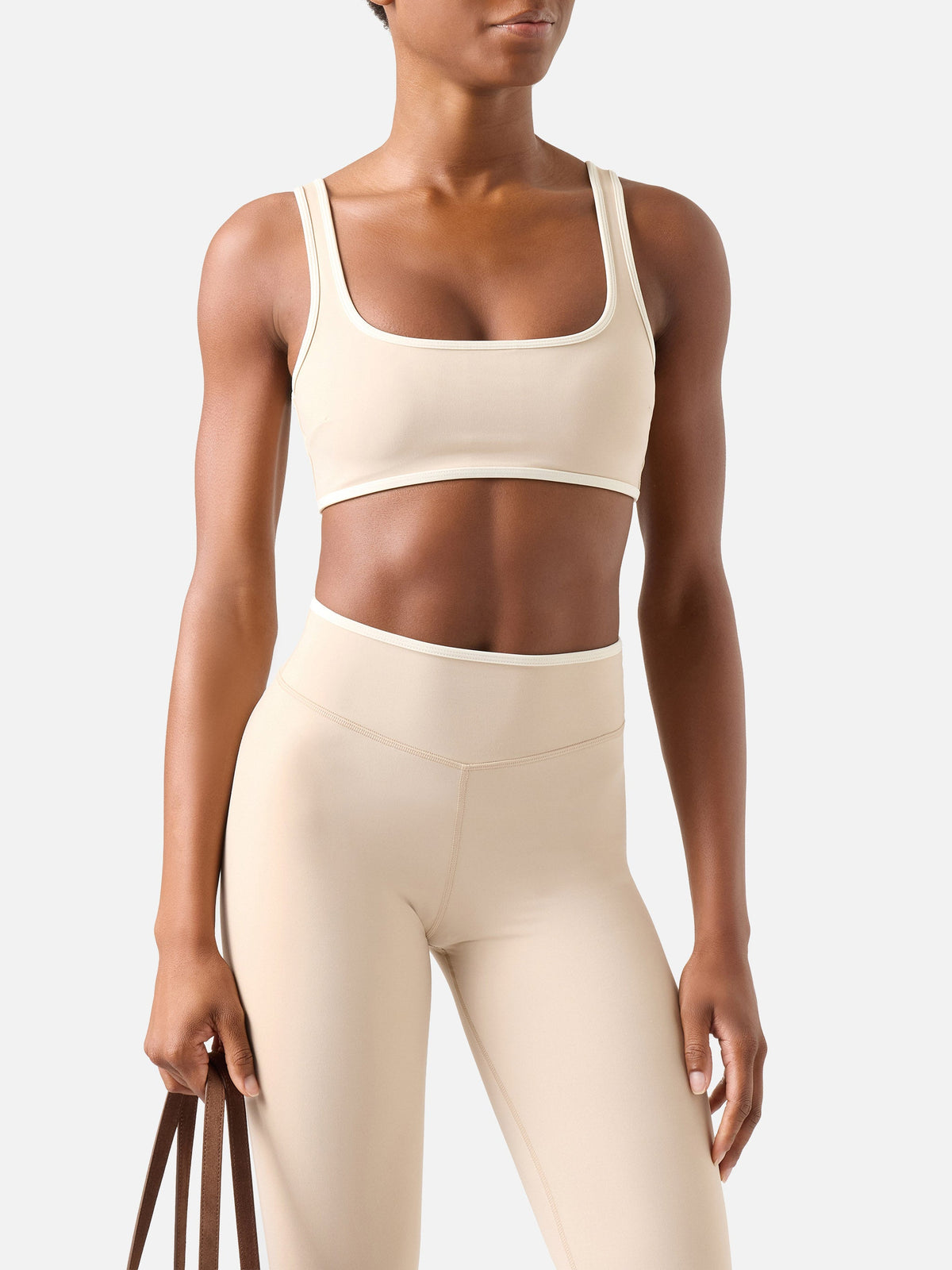 Top fitness Kassie beige con bordi a contrasto