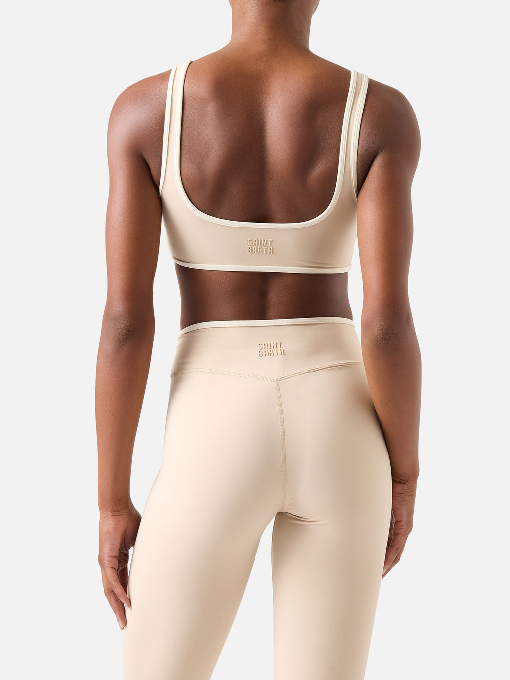 Top fitness Kassie beige con bordi a contrasto